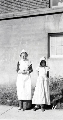 Two children in costume during the 49'er Parade in Mullan, Idaho.