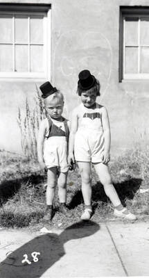 Two children in costume during the 49'er Parade in Mullan, Idaho.