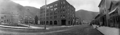 View of street corner in town. Panoramic photograph of Wallace, Idaho.