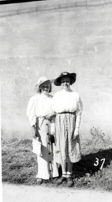 Two young girls in costume during the 49'er Parade in Mullan, Idaho.