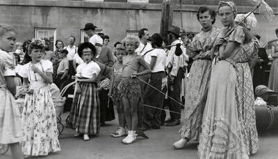 A group of young girls in costumes during the 49'er Parade in Mullan, Idaho.