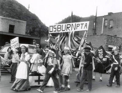 Children walking in the Children's parade during the Elks Roundup parade in Wallace, Idaho.