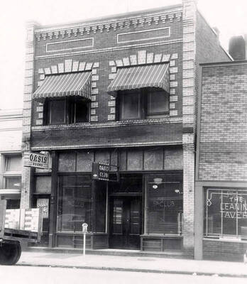 A view from the road of the Oasis Club and Leaning Tavern buildings in Wallace, Idaho.