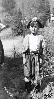 A child in costume for the Mullan 49'er parade in Mullan, Idaho.