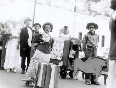 Children in costumes with homemade props during the 49'er Parade in Mullan, Idaho.