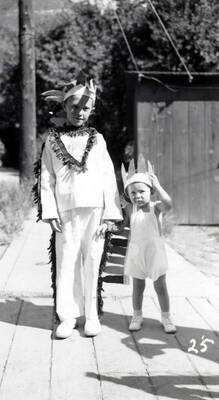 Two children in costume during the 49'er Parade in Mullan, Idaho.