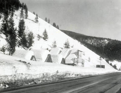 View of the Taft Hotel covered in snow in Taft, Montana.