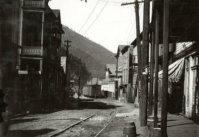 The railroad tracks in Burke, Idaho running through Main Street.