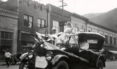 A car driving in the Elks parade in Wallace, Idaho.