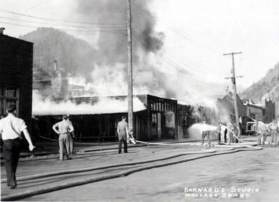 Firefighters putting out the garage fire on Residence Street in Wallace, Idaho.
