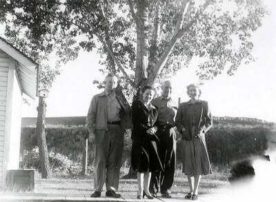 Relatives of Nellie Stockbridge on her farm near Wallace, Idaho.