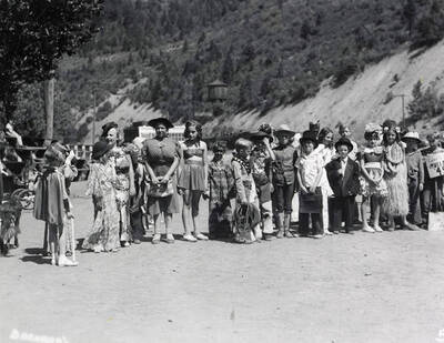 A group photo of children with their pets during the Wallace pet parade in Wallace, Idaho.