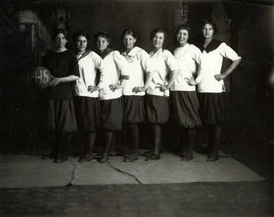 Group photo of the junior girls' basketball team at Wallace High School.