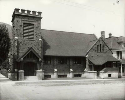 Exterior view of the Holy Trinity Episcopal Church in Wallace, Idaho. The church is located on the corner of 4th Street and Cedar Street.