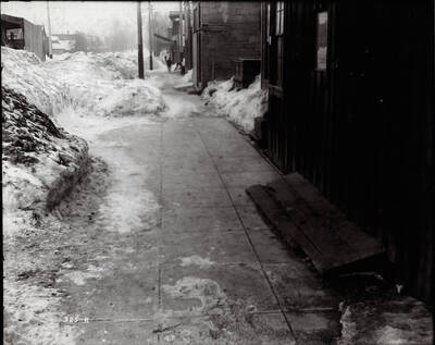 Heaps of snow on the sides of the road