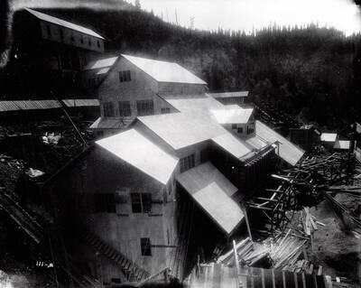 Image of the Interstate Callahan Mill located northwest of Wallace, Idaho on Nine Mile Creek at sunset.
