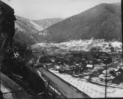 Birds Eye View in Winter, with burnt trees surrounding the town