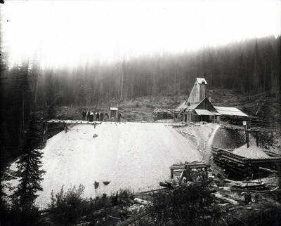 View of people outside the Tarbox mine in Saltese, Montana 1906.