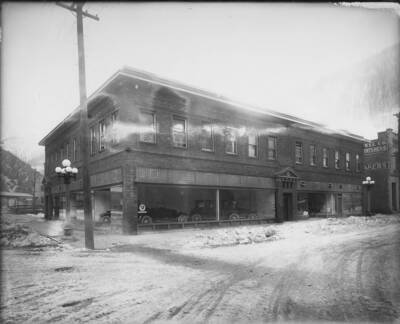 Automobiles in showroom.