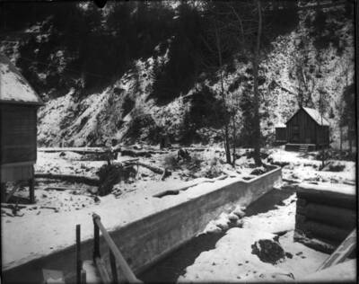 There is a dam to keep the water from flooding the houses