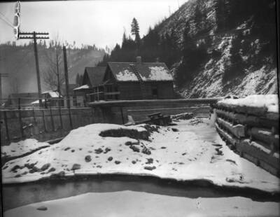 All the water is covered in ice except the little stream at the front of the picture