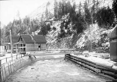 Upper King Street on Placer Creek. Town of Wallace, river blocked off with cement on the sides so not to flood