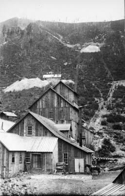 Exterior of the mill with a horse tied up