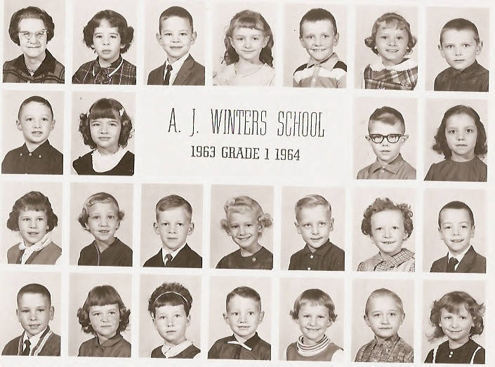 A collage of twenty-four individual portraits of young children arranged around the text, "A. J. Winters School 1963 Grade 1 1964." The children are shown in formal attire, with various hairstyles, arranged in three rows.