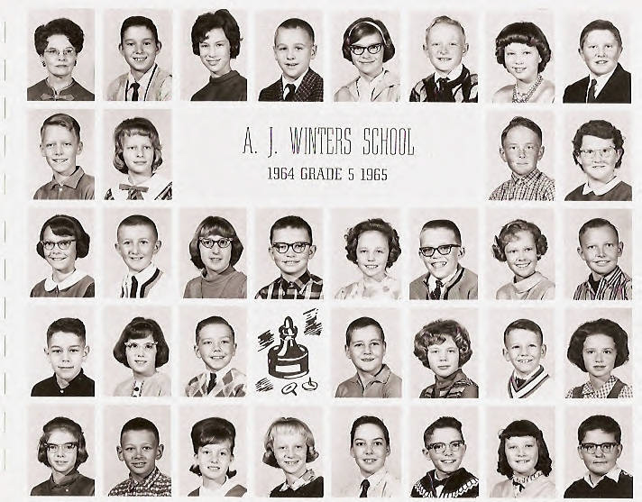 A series of small portraits arranged in rows and columns, each showing the head and shoulders of a child or a teacher. The individuals are wearing a variety of clothing styles typical of the 1960s, including collared shirts, sweaters, and dresses. In the middle, there is text that reads: "A. J. Winters School 1964 Grade 5 1965." Below some of the portraits, a drawing of a chess piece and a few scribbles is present.