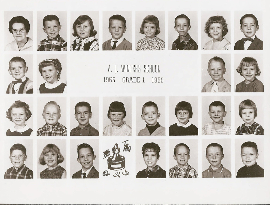 A collection of individual portraits of young children and one adult, arranged in rows. At the center is text that reads "A. J. WINTERS SCHOOL 1965 GRADE 1 1966." Each child is looking forward, smiling or with neutral expressions. An illustration of a school bell and books appears at the bottom right.