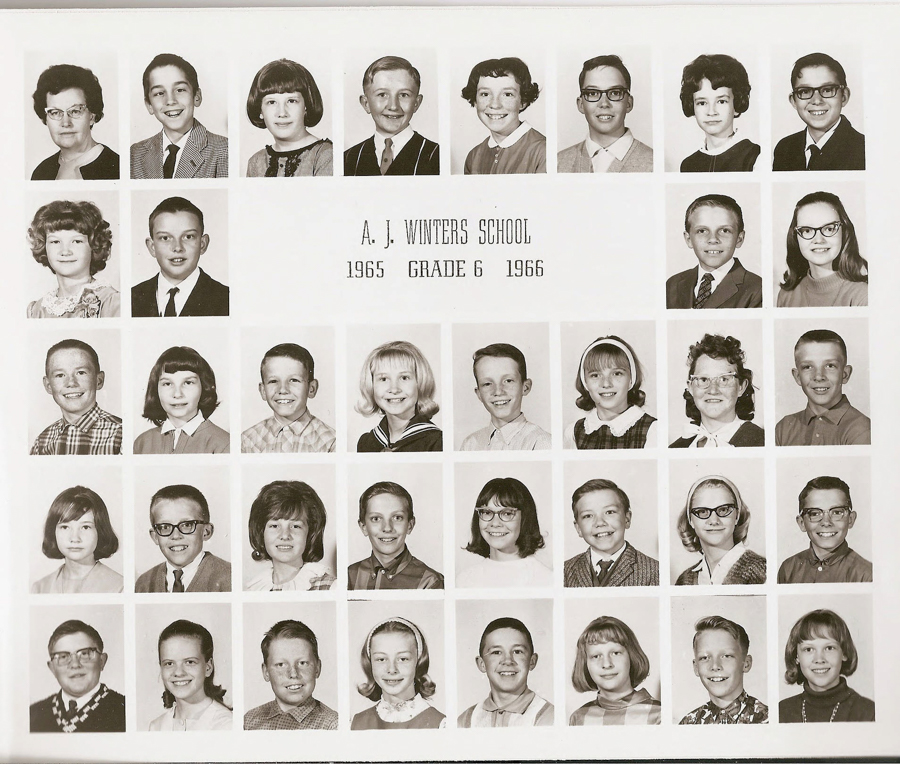 A grid of individual portraits featuring school children and one adult. The central text reads "A. J. Winters School 1965 Grade 6 1966."