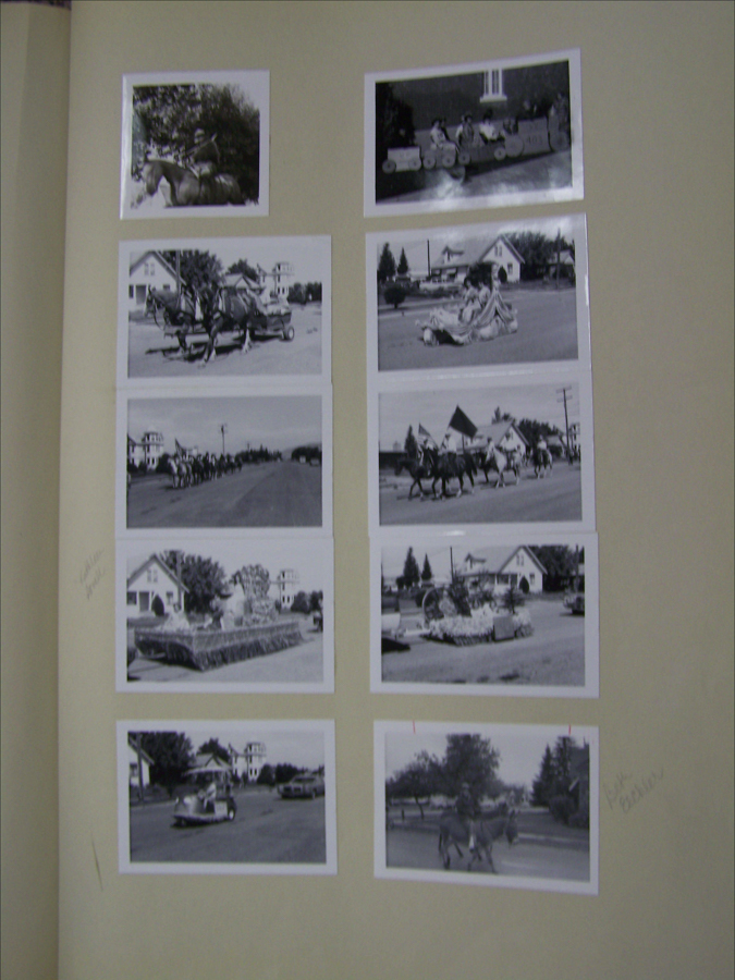 A collection of eight images displayed on a page. The images depict various scenes including people riding horses, floats in a parade, and children on a small train. The background shows houses and streets in a town setting. Handwritten notes are visible on the page: "Golden Rose" and "Best Costume."