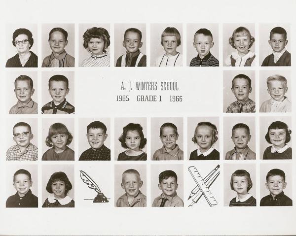 A grid of school portraits showing young children and a teacher. In the center, text reads: "A. J. Winters School 1965 Grade 1 1966." Below the portraits, there are illustrations of a quill with an inkwell and crossed pencils.