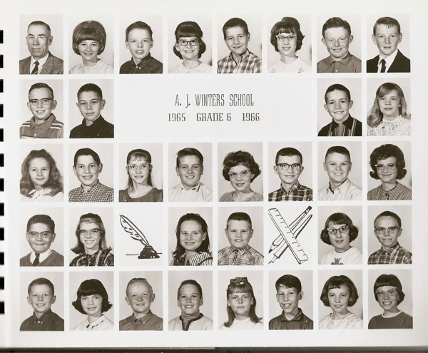 A grid of small individual portraits, mostly of children, arranged in rows. In the middle, there is text that reads "A. J. Winters School, 1965 Grade 6 1966." Below the text are illustrations of a quill and ink bottle, and a pair of rulers.