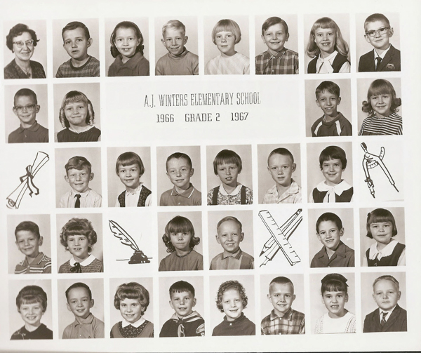 A collection of individual portraits arranged in rows, showing young children and one adult. In the center, there is text that reads "A.J. Winters Elementary School 1966 Grade 2 1967." Decorative drawings of a diploma, feather quill, compass, and ruler are interspersed among the images. The children and the adult are dressed in a variety of attire, including sweaters, collared shirts, and dresses.