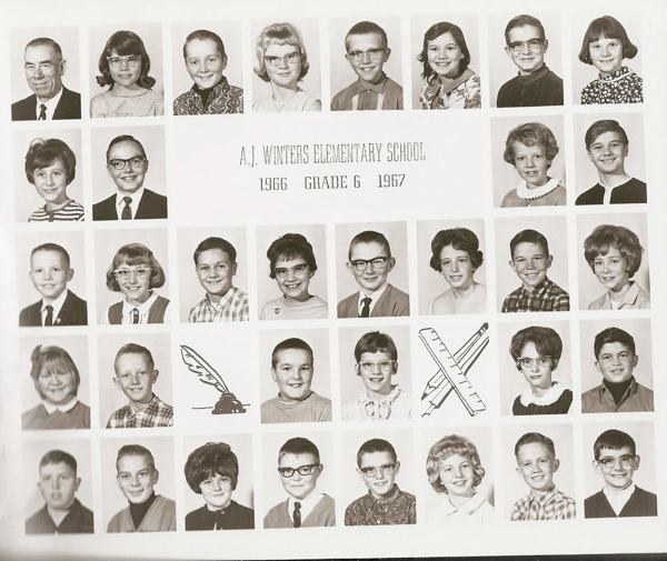 A collection of individual portraits arranged in rows features children and one adult, presumably a teacher, all wearing 1960s attire. Many of the children have glasses. The text reads "A.J. Winters Elementary School, 1966 Grade 6 1967." There are drawings of a quill in ink and crossed rulers included among the portraits.