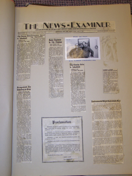 A newspaper page titled "The News-Examiner" from Montpelier, Idaho, dated April 6, 1972. The content includes articles about a city cleanup drive and environmental issues. There is a black and white photograph of two men labeled "Cleanup Chairmen" above one of the articles. An official proclamation by James Olsen, Mayor of Montpelier, regarding community welfare and safety, is included. Various articles cover topics related to city planning and environmental concerns. Handwritten notes are visible on the right side of the page.