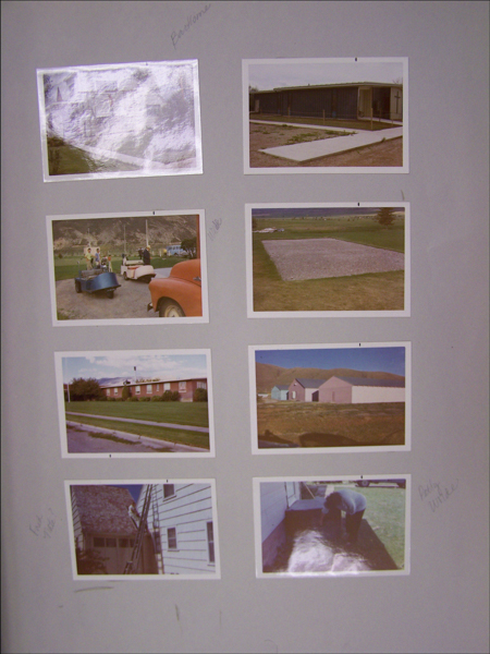 Eight photographs arranged on a gray background. Handwritten notes next to some photos: "Bordelon," "Wilde," and "Dolly Wilde?" 

1. A blank or misprinted photo with no visible image.
2. A long, single-story building with a cross near the entrance and a paved path leading to it.
3. A group of adults and children on a small ride, next to an orange car in a park setting.
4. A rectangular gravel area in an open green space.
5. A single-story building with a manicured lawn and mountains in the background.
6. Two buildings, one pink and one turquoise, set against barren hills.
7. A person on a ladder against a house with a gabled roof.
8. A person bending down near an outdoor area beside a house.
