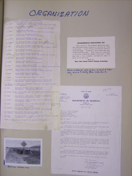 "Organization" is written at the top of the page. Below, there is a typed list of locations and names of individuals next to them. A notice titled "Environmental Educational Day" describes a cleanup event organized by the Bear Lake County School Cleanup Committee, noting that motorists receive a card, a litter bag, and a friendly Bear Lake smile. A letter from the Idaho Department of Highways, dated April 13, 1971, addresses support for a roadside litter project by Bear Lake Schools. At the bottom left, there is an image labeled "Getting Underway," showing people working near a road sign.