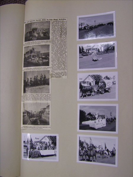 A page containing a newspaper clipping and several photographs. The clipping headline reads, "Gay and Colorful Parade Adds To Fair Week Activities," and it includes a story about a fair and parade. Below the headline, there are three images with captions describing parade floats and participants. To the right, there are five photographs of parade scenes, including horses, floats, and people in costumes, some carrying flags.