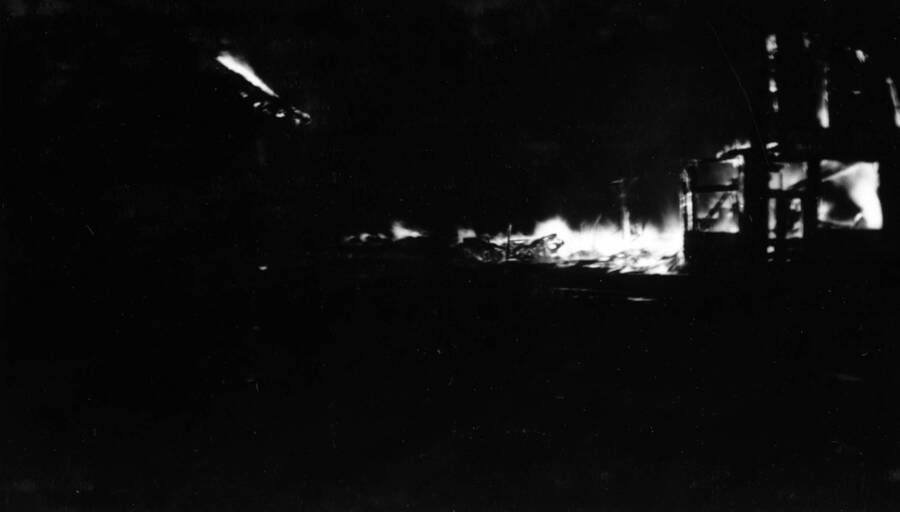 Night time image of the forest fire burning buildings in Wallace, Idaho August 20, 1910.