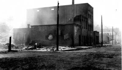 Image of Wallace, Idaho after the fire of August 20, 1910, with debris from a damaged building