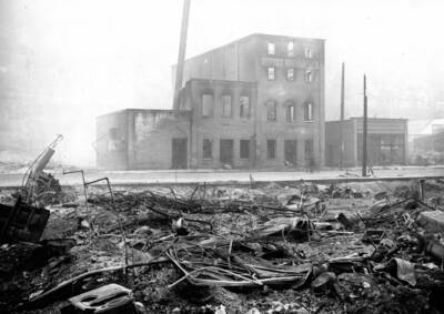 Image is of debris from damaged Wallace Brewery building. Forest fire 1910.