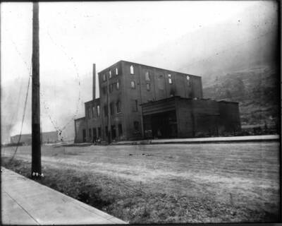 Image is of debris from damaged Wallace Brewery building. Forest fire 1910.