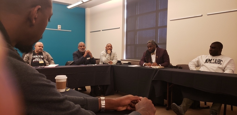 Dr. Sydney Freeman, Jr. in conversation with other attendees at the Association for Black Cultural Centers Conference.