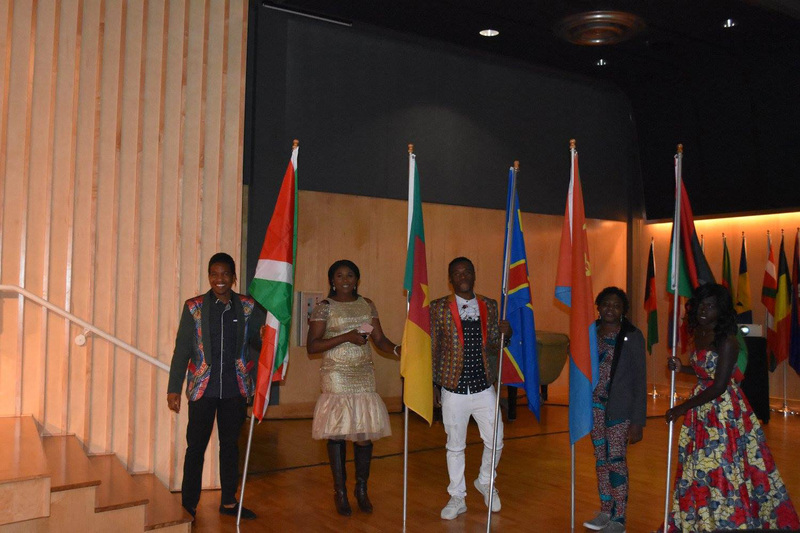 Students carrying the flags of their country at Africa Night 2017.