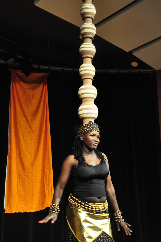 Dancer performing the Ugandan Pot Dance at the 2019 Africa Night.