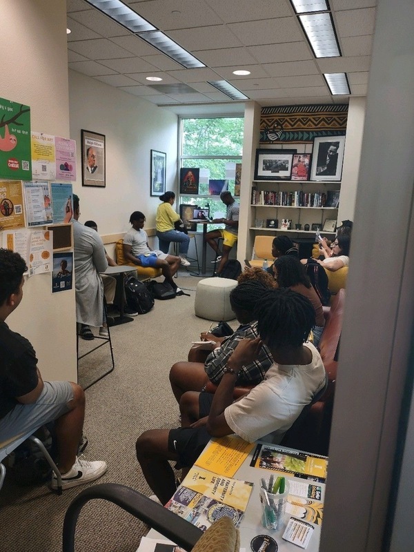 Students sitting inside the BAACC.