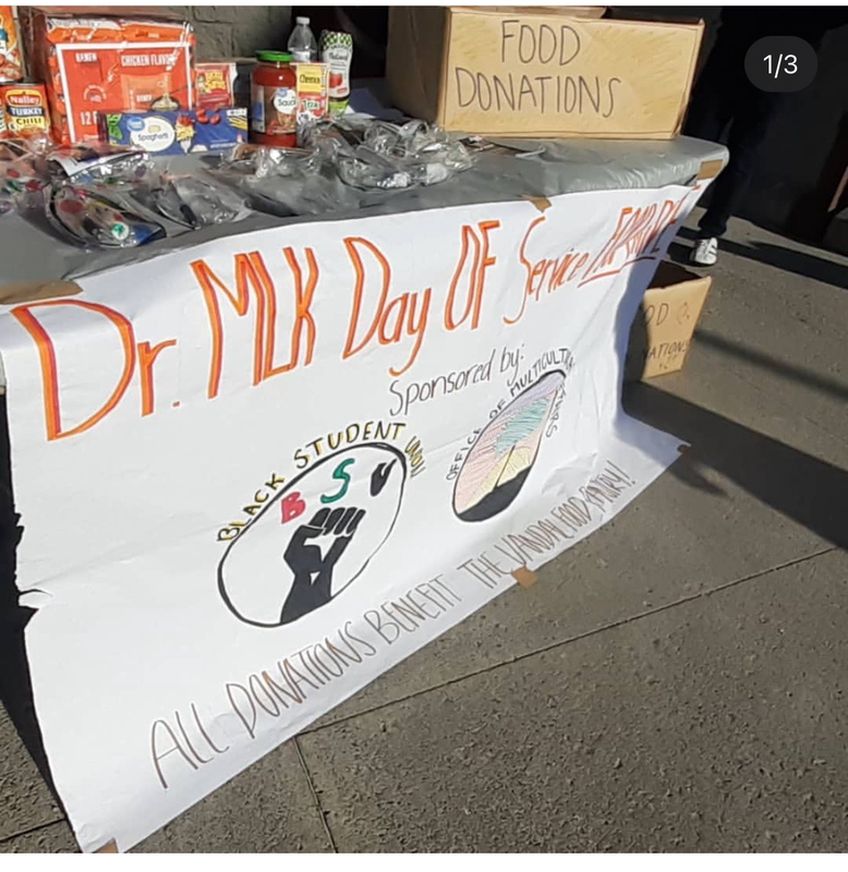 Dr. MLK Day of Service Food Drive table at the Moscow Walmart.