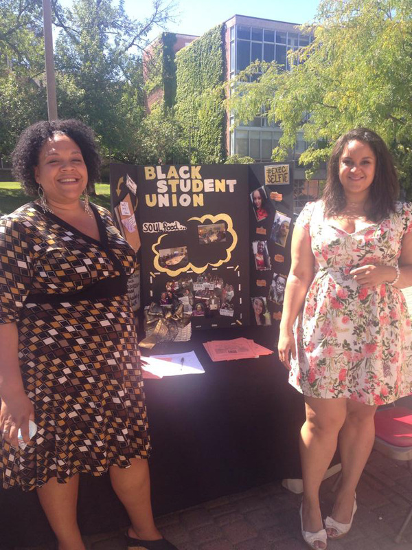 Jessica Samuels, BSU advisor, and Chelsea Butler, BSU student officer recruiting potential members at FEM Fest 2014.